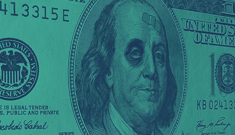 photo of 100 dollar bill showing Ben Franklin with bruised eye