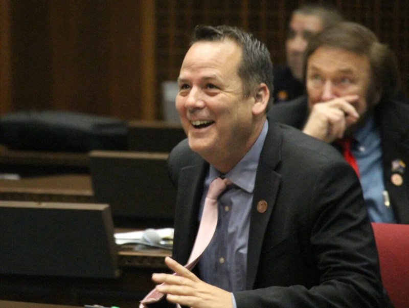 man in suit laughing