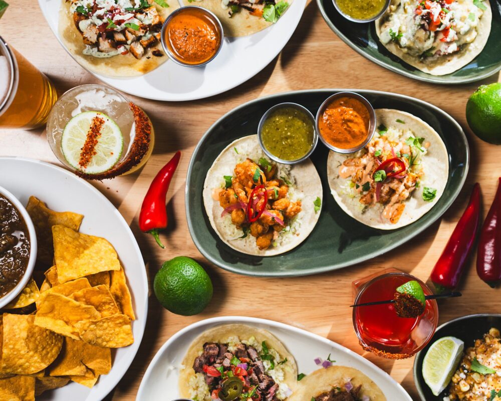 Several dishes including street tacos served at Redbird Kitchen in Tucson