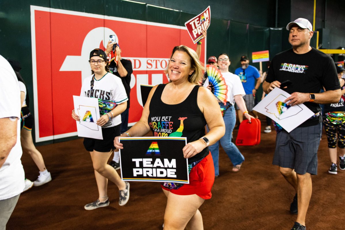folks walking in a pride event 