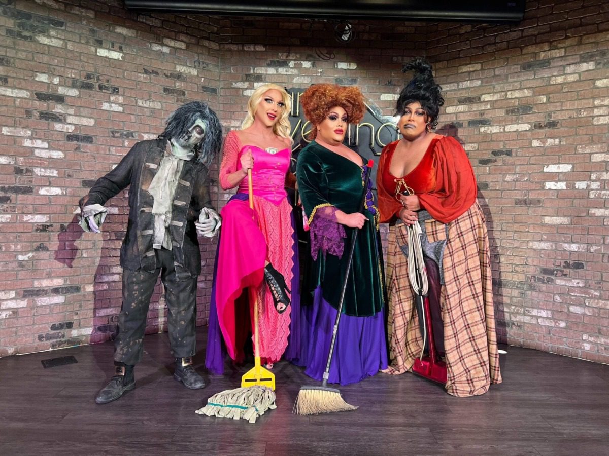 folks dressed as Hocus Pocus characters at a drag event 