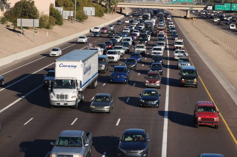 people driving on the freeway