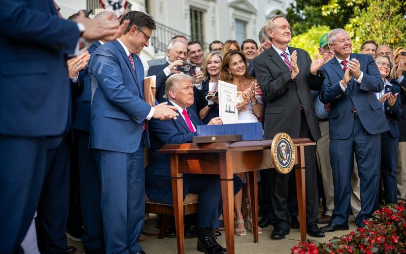 President Donald Trump signs the One Big Beautiful Bill Act on the South Lawn of the White House
