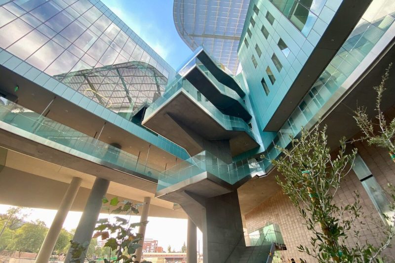 an elevated walkway of a modern looking building