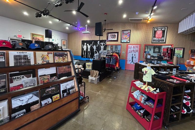 inside of a record store with a stage