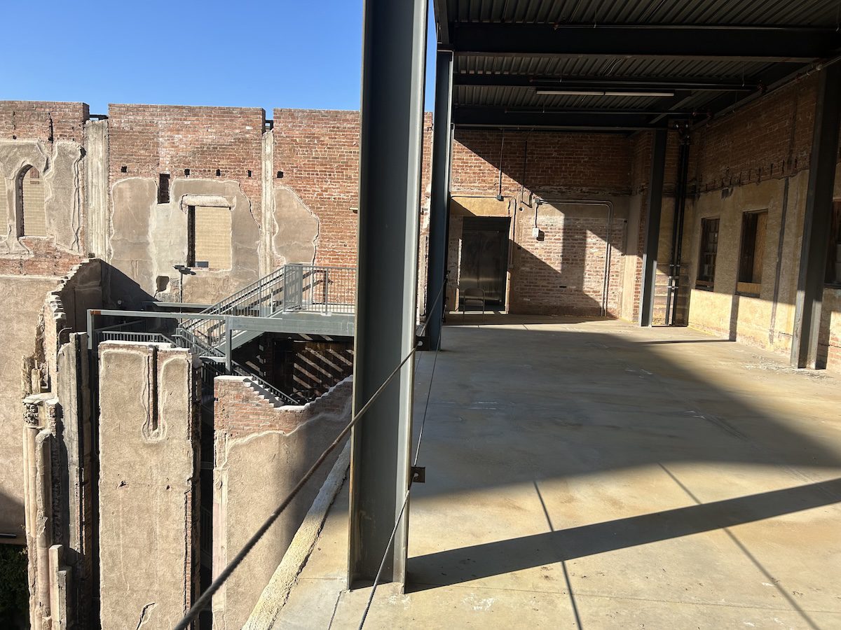 the upper floor of an outdoor courtyard