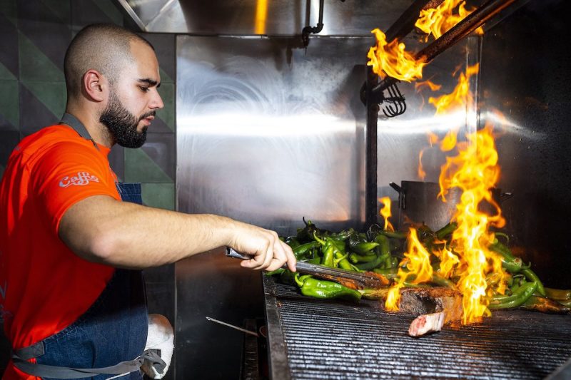 chef grilling a steak