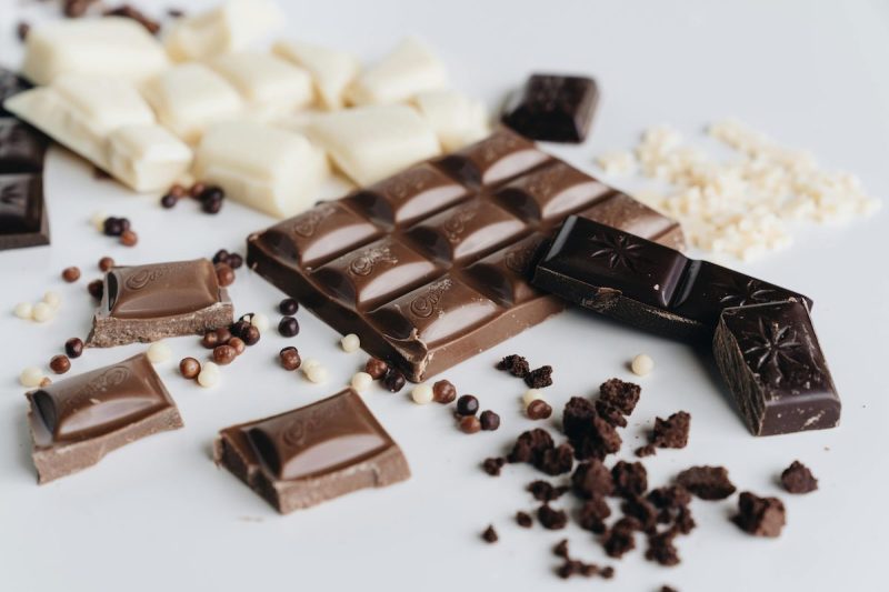 pieces of white, milk, and dark chocolate broken up