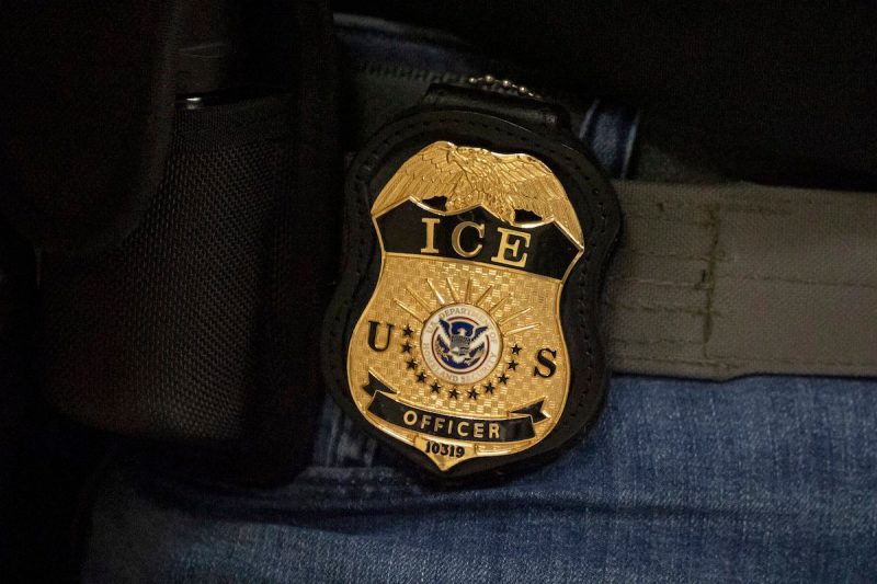close-up photo of an ICE officer's badge