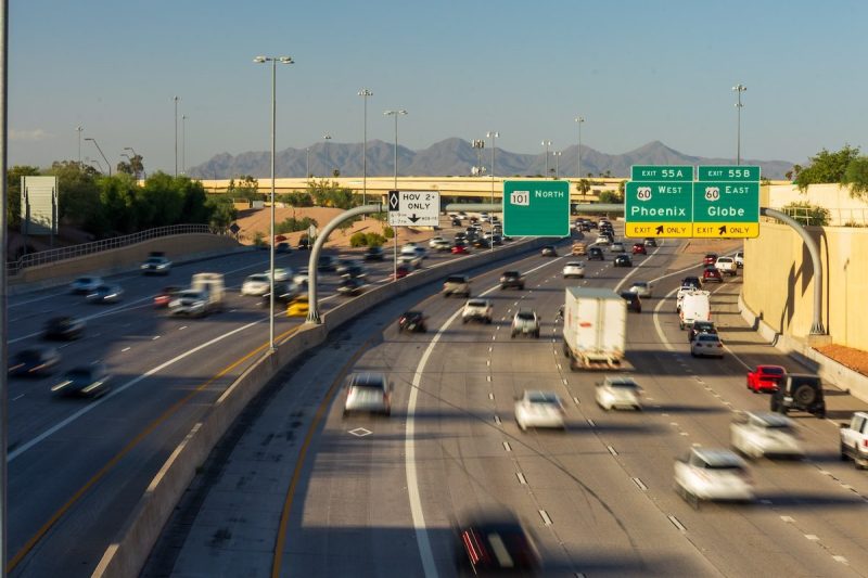 overhead view of both directions of traffic on loop 101 with right hand exits for 60 west Phoenix and 60 east Globe
